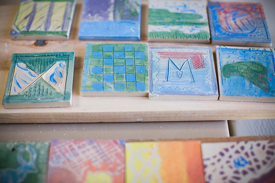 Tiles from the morning exercise are laid out to dry. Stephanie Mitchell/Harvard Staff Photographer