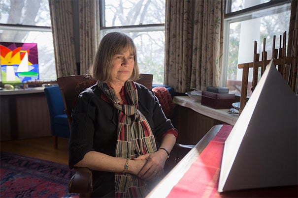 Harvard psychiatrist Jacqueline Olds offered some tips for coping with the dark days of a New England winter and the snow that accompanied it this year. While in her office, Olds demonstrated the use of a light box, a therapy often used for those who have seasonal affective disorder (SAD).