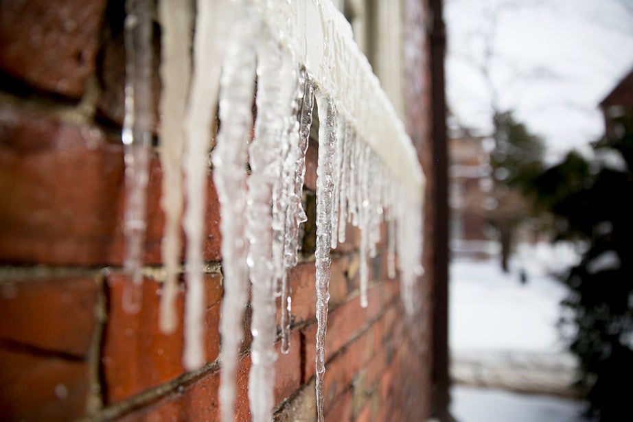 Icicles hang from the windowsills of the Memorial Church. Rose Lincoln/Harvard Staff Photographer