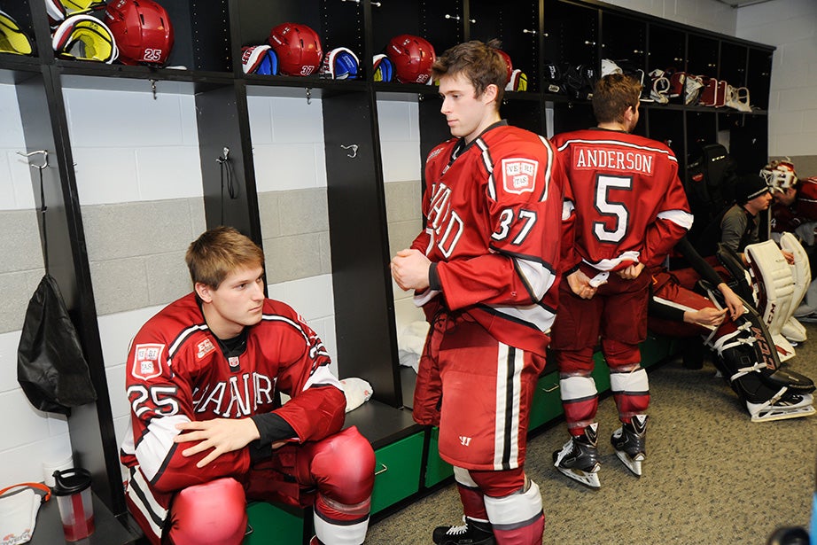Crimson players Wiley Sherman ’18 (from left), Desmond Bergin ’16, and Clay Anderson ’17 take a few quiet moments as they prepare to take the ice against their crosstown rivals Boston University in the Beanpot opening round. Jon Chase/Harvard Staff Photographer