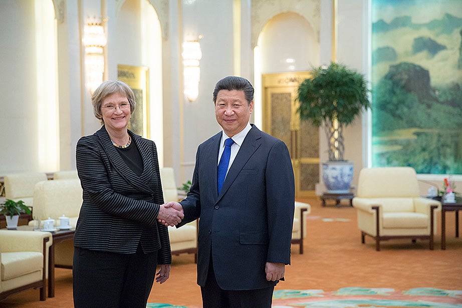 Drew Faust meets with Xi Jinping inside the Great Hall of the People in Beijing.