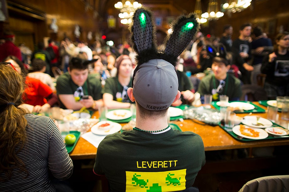 A Leverett House student dines in his bunny ears. Stephanie Mitchell/Harvard Staff Photographer