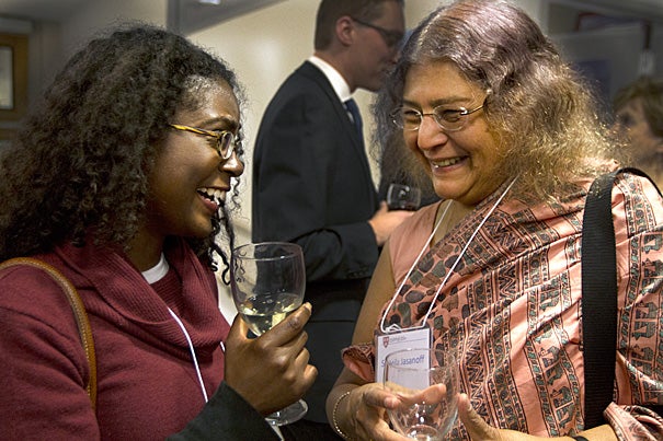 At the reunion for Environmental Science and Public Policy graduates, Nicole Maywah (left), Class of 1997, mingled with Sheila Jasanoff, Pforzheimer Professor of Science and Technology Studies at the Harvard Kennedy School. 
