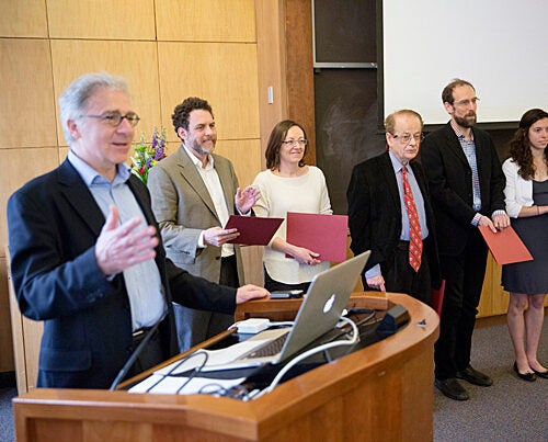 Douglas Melton (from left) presented Star Family Challenge awards to five Harvard faculty: Joshua Greene, Paola Arlotta, Federico Capasso, David Keith, and accepting for Daniel Schrag was research assistant Lauren Benson Kuntz.