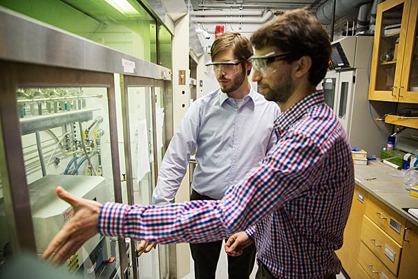 A new, first-of-its-kind technique developed by Bobby Day (left) and Max Mankin, graduate students working in the lab of Charles Lieber, the Mark Hyman Jr. Professor of Chemistry, could have applications in areas ranging from consumer electronics to solar panels.