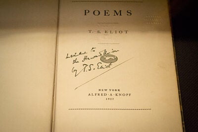 April is National Poetry Month, though at Harvard every month could be. This book of poems is signed by T.S. Eliot, who graduated from Harvard in 1909. Photo by Thomas Earle