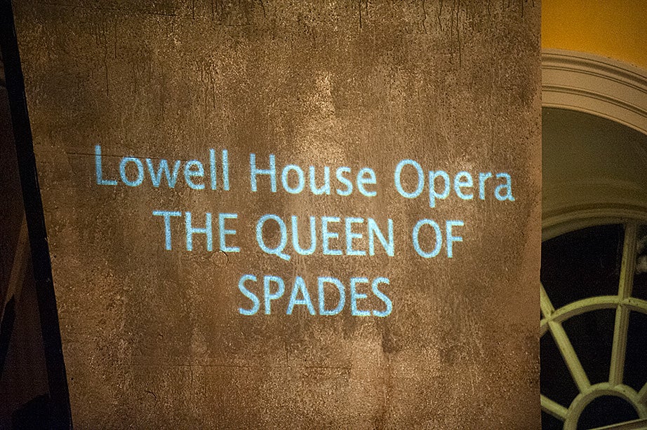 Subtitles were projected onto a flat, floor-to-ceiling board on the set. 