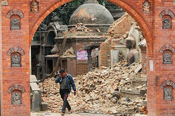 With Nepal struggling to grasp the enormous calamity caused by the magnitude 7.8 earthquake that struck north of Kathmandu Saturday, Harvard is mobilizing to help with technical and medical assistance and reaching out to faculty, staff, and students visiting the region. On Sunday, a Nepalese man cries as he walks through the earthquake debris in Bhaktapur.