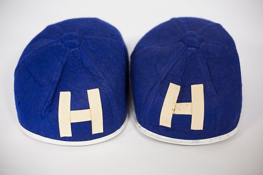 Matching homemade Class of 1915 reunion beanies, a gift from Emanuel Benjamin Friedberg, Class of 1915, (and MD 1920). The letters are rendered in adhesive tape. (Harvard University Archives)