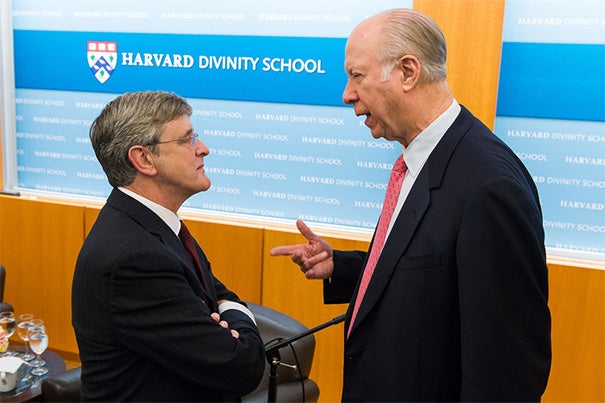 Professor David Gergen (right) told a Harvard Divinity School audience that it was important not to overstate the impact of religion on the decisions of the chief executives for whom he had worked, yet he marveled at the influence that the Rev. Billy Graham has had over presidents since Harry Truman. Gergen spoke with HDS Dean David N. Hempton (left) during the wide-ranging conversation on Friday.