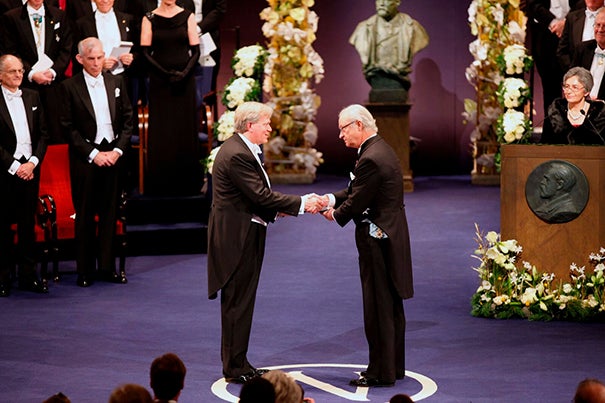Brian Schmidt (left), now a distinguished professor at the Australian National University, received the 2011 Nobel Prize in physics for determining that the universe's expansion was accelerating. His return to campus is a homecoming — he completed his Ph.D. at Harvard and called it "arguably the best time of my life."