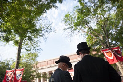 Tradition will always make a Harvard Commencement special. Top hats mark the 364th Commencement. Stephanie Mitchell/Harvard Staff Photographer