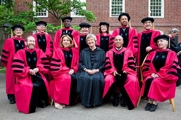 President Drew Faust (center, black robe) sits among those who will be receiving honorary degrees during Harvard's 364th Commencement. Harvard Provost Alan M. Garber (front row, far left) is also pictured.