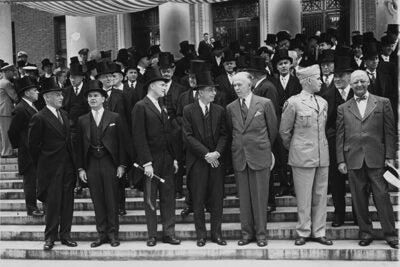 George C. Marshall (third from right) talks with Harvard President James Bryant Conant on the steps of Widener Library during Harvard's Commencement in 1947. Henry Kissinger recalls the content of Marshall's 1947 Commencement address, which marked a historic departure in American foreign policy. 