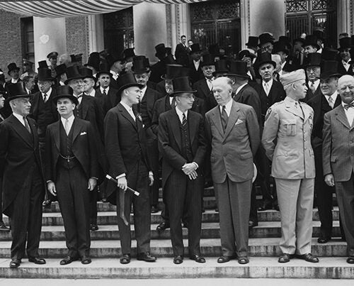 George C. Marshall (third from right) talks with Harvard President James Bryant Conant on the steps of Widener Library during Harvard's Commencement in 1947. Henry Kissinger recalls the content of Marshall's 1947 Commencement address, which marked a historic departure in American foreign policy. 