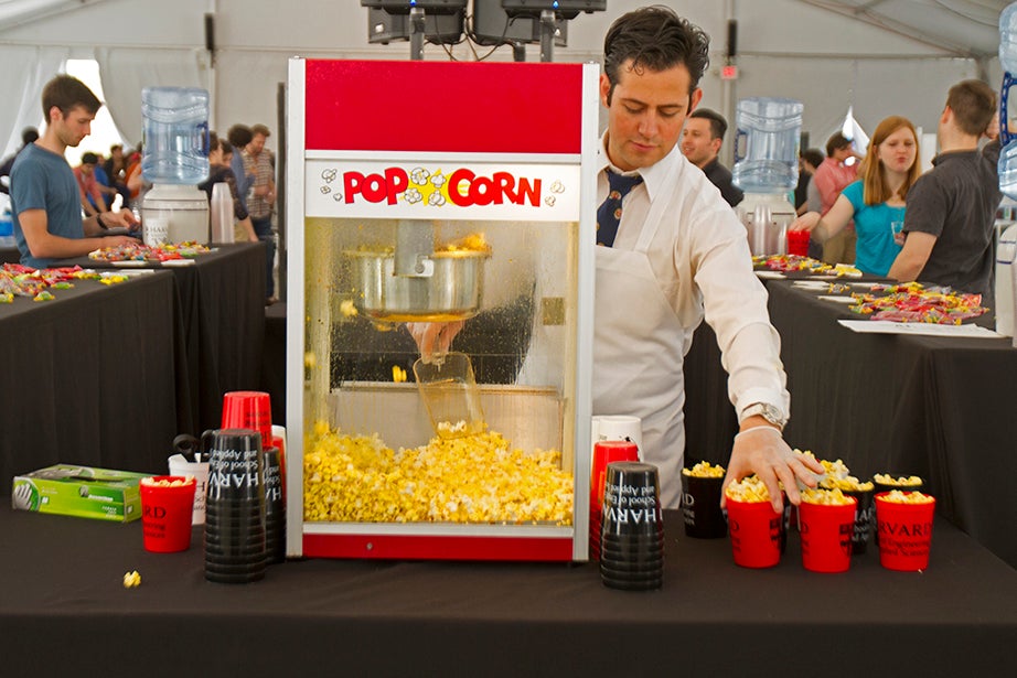 Jesus Romo serves popcorn at the SEAS Design and Project Fair. 