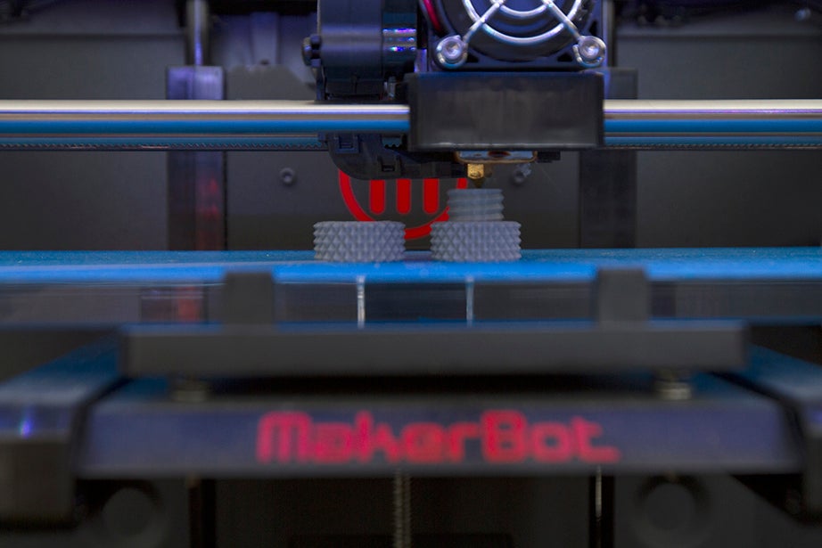 A 3-D printer at work. 