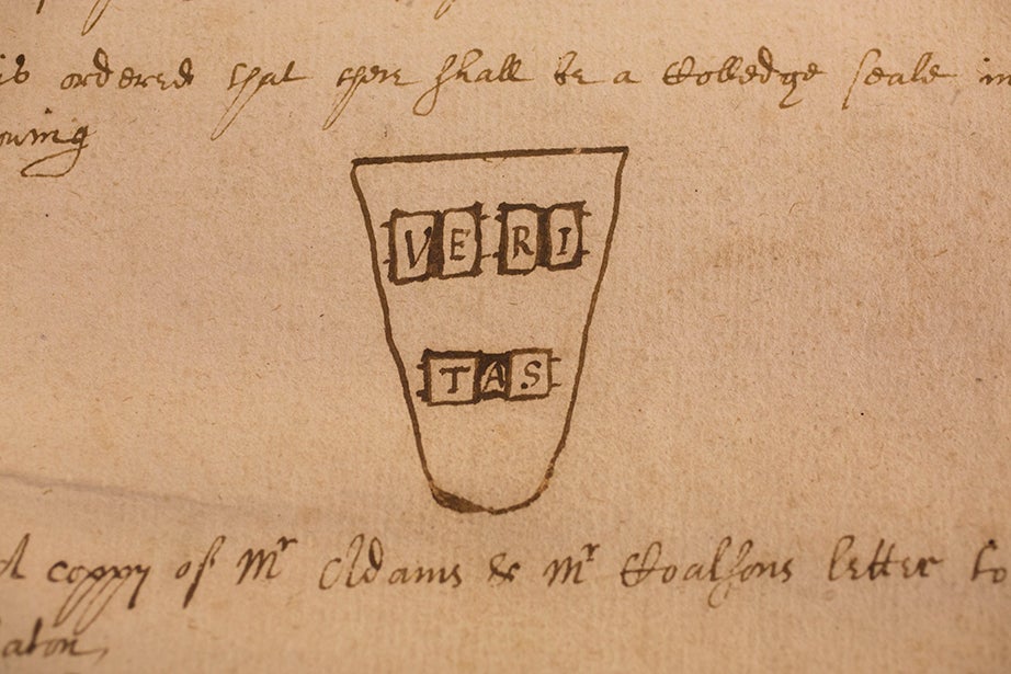 A proposed design for the original Veritas shield, drawn on page 27 of College Book I, the Harvard Corporation’s earliest records, in an entry from Dec. 27, 1643.