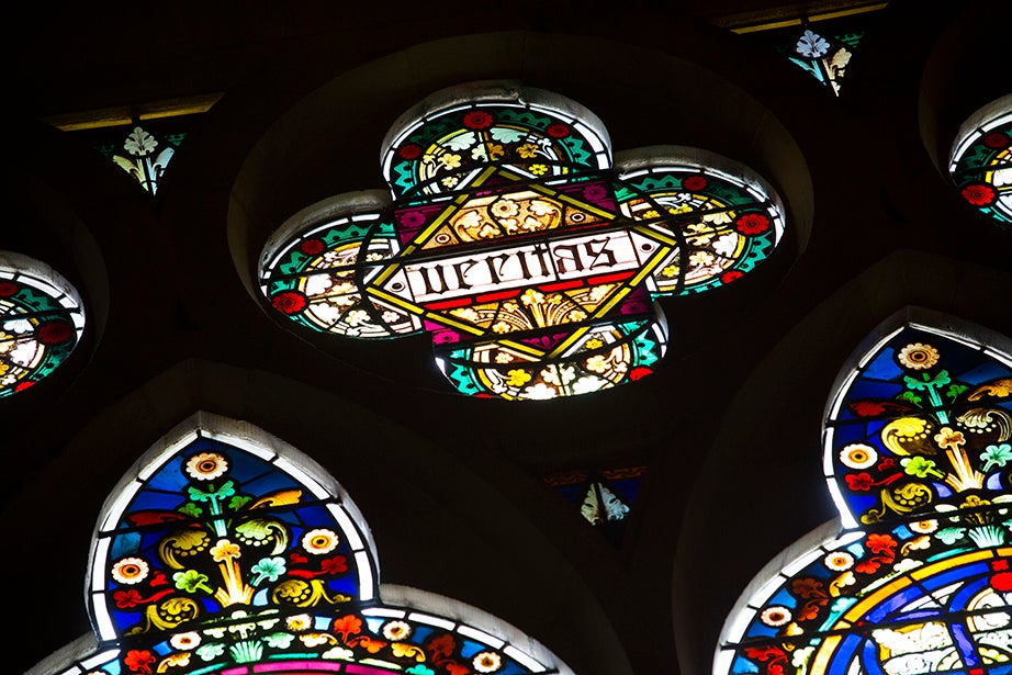 In the transept of Memorial Hall, a Veritas shield in stained glass. 