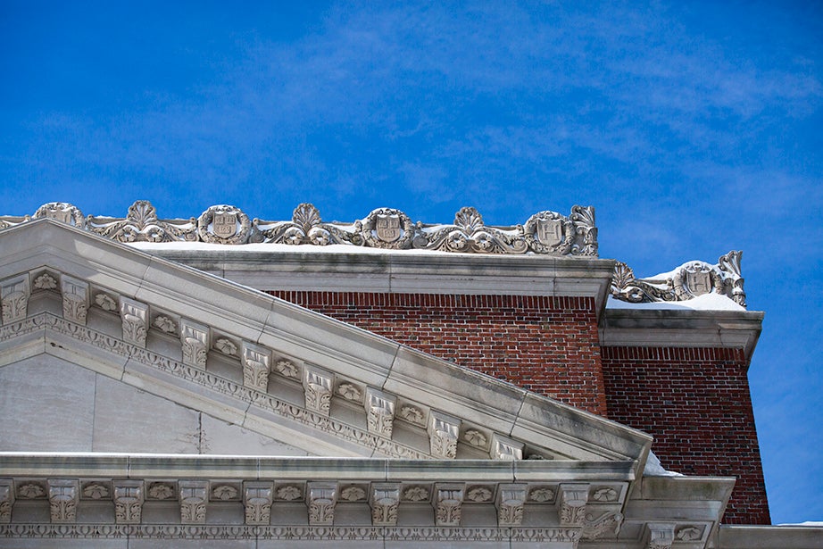 Along the north roofline of Widener Library. 