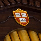 Harvard University has veritas shields on display in every corner of the campus. A veritas shield is pictured above the organ in Memorial Church. Stephanie Mitchell/Harvard Staff Photographer