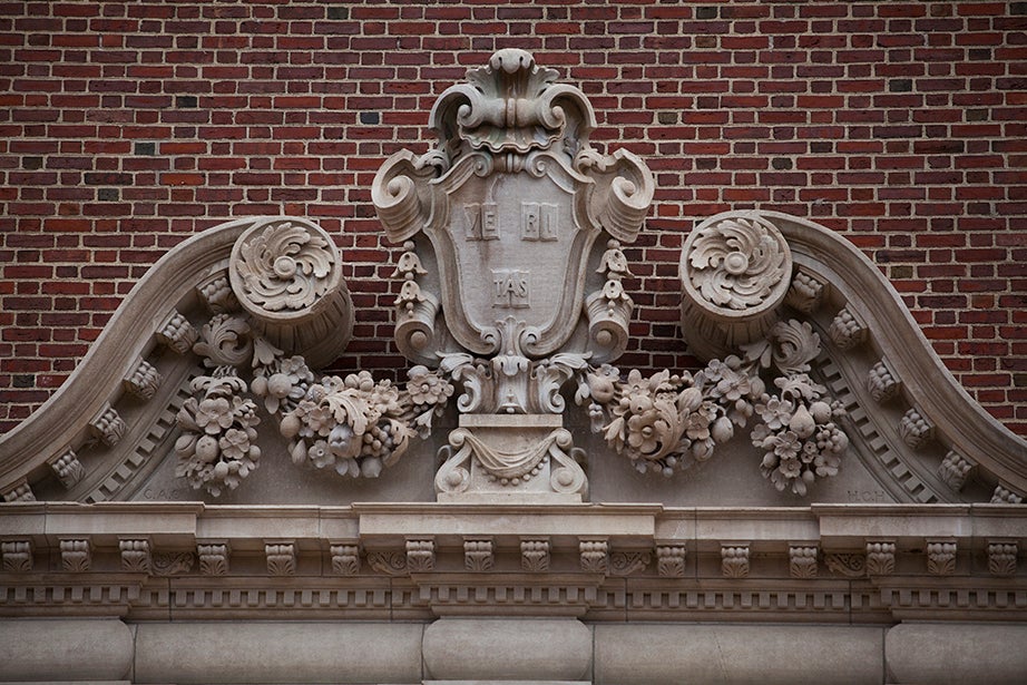 From 1896, a Veritas shield on the exterior of what was once the Fogg Museum and is now the Harvard Art Museums.