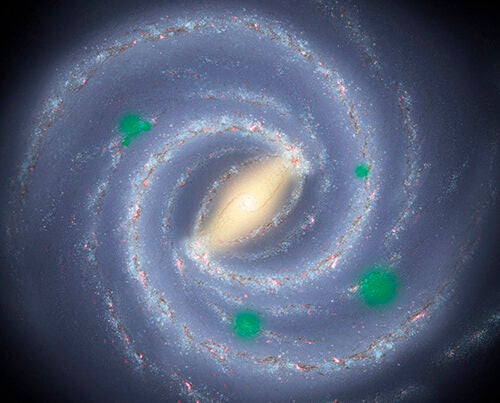 In this artist’s theoretical conception of the Milky Way galaxy, translucent green “bubbles” mark areas where life has spread beyond its home system to create cosmic oases, a process called panspermia. New research suggests that if it occurs, we could detect possible signs of life on planets orbiting distant stars.