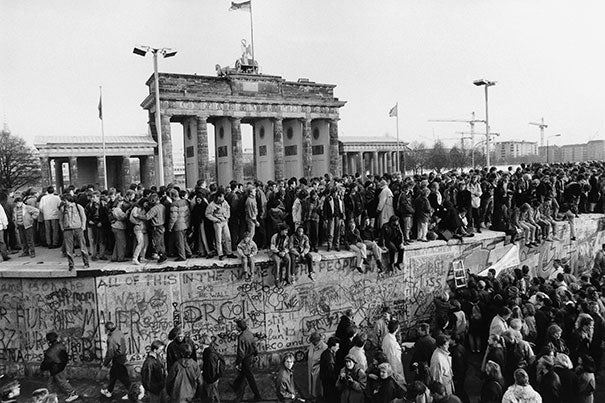 Some of Barbara Klemm's historic images include the fall of the Berlin Wall (photo 1), a fraternal kiss between Leonid Brezhnev and Erich Honecker (photo 2), and the opening of the Brandenburg Gate, Berlin (photo 3).
