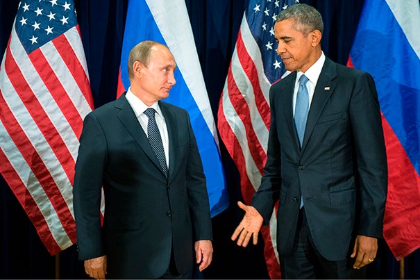 President Barack Obama and Russia's President Vladimir Putin posed for members of the media before a bilateral meeting at United Nations headquarters on Sept. 28. Putin caught many off-guard during the United Nations’ General Assembly by announcing a new arrangement with Iraq, Iran, and Syria to share information in the fight against the Islamic State. 