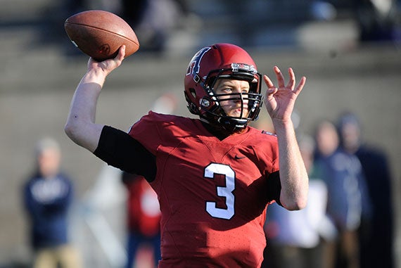Harvard football v. Penn. Facing a late afternoon sun, QB Scott Hosch '16 gets set to pass. Hosch completed 20-of-30 passes for 246 yards and two touchdowns, including 134 to classmate Ben Braunecker '16. Jon Chase/Harvard Staff Photographer