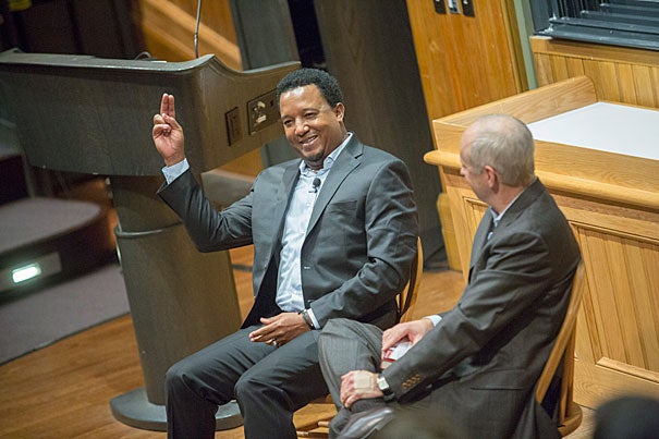 “I became a lot wealthier than I was when I was in the shack, for sure, but I don’t know that I would trade my childhood for probably any other," retired Boston Red Sox pitcher Pedro Martinez told Harvard Professor Michael Sandel. “My struggles made me appreciate every little success I had in my career.” Martinez responded to a request and demonstrated a pitching technique during the talk.