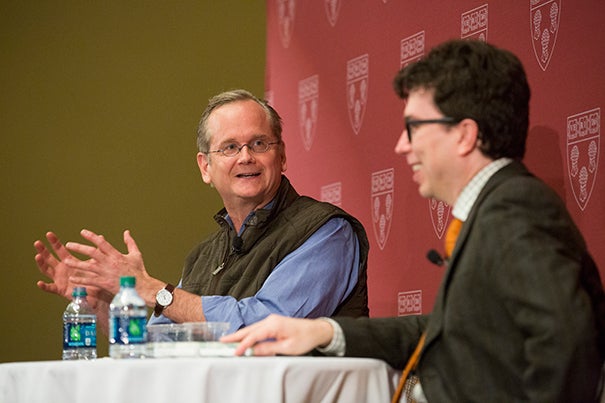 Harvard Law School Professor Lawrence Lessig (left) shared what he learned from his failed presidential bid during a conversation with colleague Jonathan Zittrain. “Money has corrupted our political process,” said Lessig. 