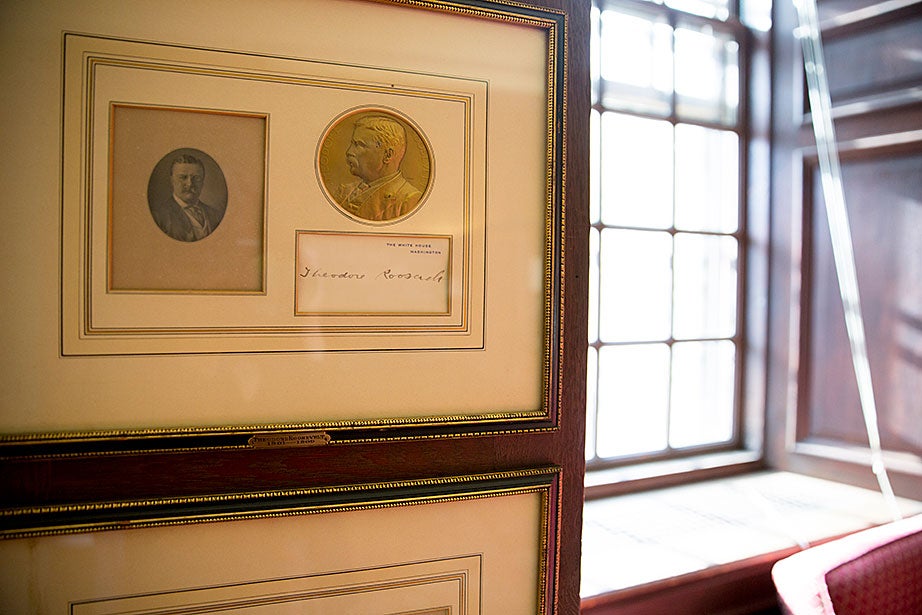 The presidential coin collection in the Eliot House library includes one of Theodore Roosevelt.