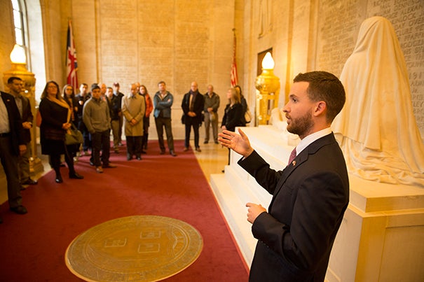 Harvard continuing education student and Army Specialist J. Holden Gibbons led 50 fellow veterans on a tour of Memorial Hall as part of the inaugural Official Harvard Military History Tour. Director of the Harvard Veterans Alumni Organization former Capt. 