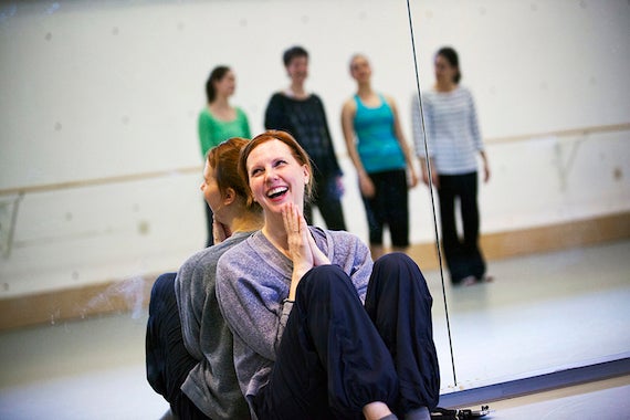 Harvard Dance Director Jill Johnson teaches the Harvard Dance Project. This faculty-led, student performance company gives students the opportunity to be original cast members and collaborators in two or more diverse dance works created by professional choreographers. Jill Johnson is pictured applauding a dance during class in the Harvard Dance Center. Stephanie Mitchell/Harvard Staff Photographer