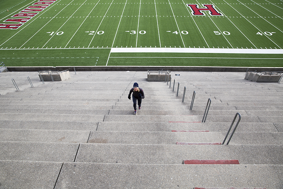 Jenny Frutchy, Ed.M. '82, a spry 61 years young, appears dwarfed by a sea of steps as she makes her way up a row of seats. “I hike the seats for half an hour, then I go swim a mile at Blodgett. I do the steps as conditioning for skiing, which I do all winter," she says. 