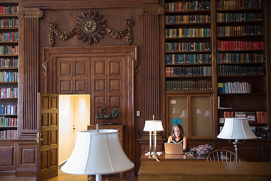 Elena Breer ’18 enjoys the Harvard Library study room in the newly renovated Dunster House. Kris Snibbe/Harvard Staff Photographer