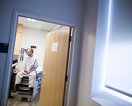 Cory Scott and Betty Paulsen (not pictured) are both standardized patients at Harvard Medical School's Clinical Skills Center, which allows students to train with people acting like they are sick.
