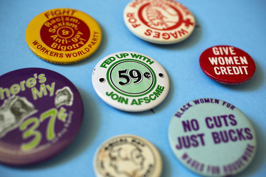 Income-equality buttons track the slow rise of women’s wages compared with their male counterparts’.