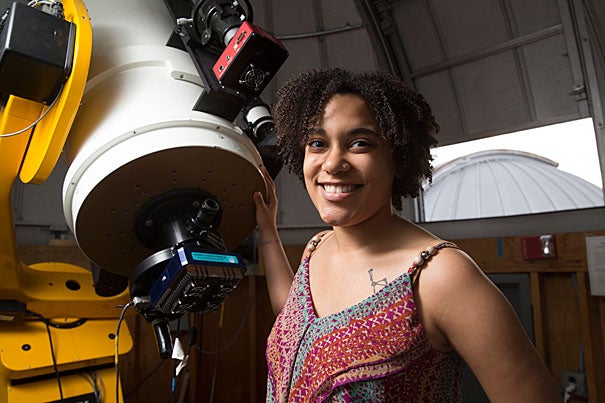 Moiya McTier '16, a dual concentrator in astrophysics and folklore and mythology, combined her interests by writing a science-fiction novel for her thesis. 