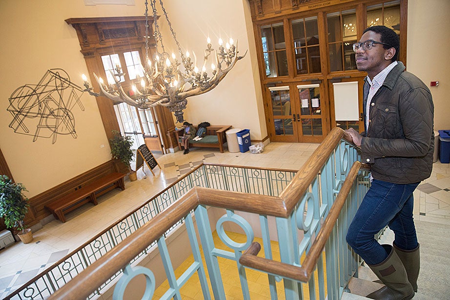 Inside the great staircase in the Barker Center, Bradley Craig, a student in the Graduate School of Arts and Sciences, marvels at the antler chandelier that was donated by President Theodore Roosevelt and recently upgraded with LED bulbs. The energy-efficient bulbs are being installed throughout the University’s buildings, including the Harvard Art Museums and Widener Library, as part of Harvard’s focus on improving energy efficiency and reducing greenhouse gas emissions.