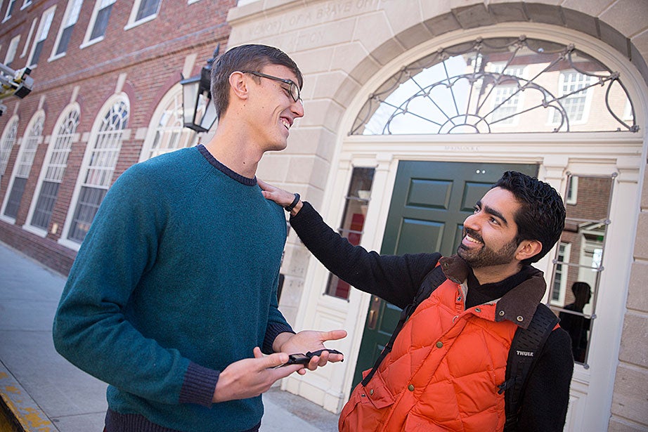 Alex Hem ’16, who works with the Undergraduate Resource Efficiency Program, talks with Jose “Memo” Guillermo Cedeño Laurent, a researcher at the Harvard T.H. Chan School of Public Health, outside the newly renovated McKinlock Hall at Leverett House. Hem participated in a “living laboratory” study led by Laurent, who won two Climate Change Solutions Fund grants at Harvard. This study monitors students’ wellness, sleep, and fitness habits. “We want to understand how buildings can enable our students not only to be the most accomplished, but also to be as healthy and happy as they can be,” says Laurent. 