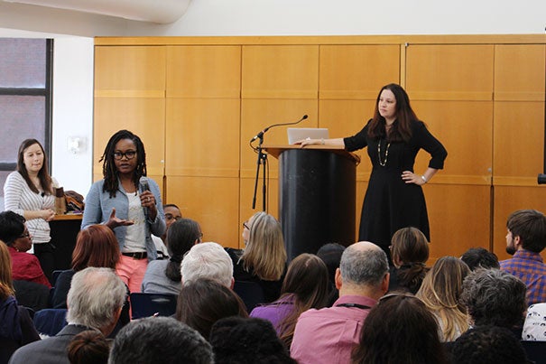 Katherine Emerson (left), a research associate at Mills College, and Mary Murphy (right), assistant professor of psychology at Indiana University, listened as an audience member asked a question during the Diversity Dialogue "Identity Threat at Work." During the talk, Murphy cited studies that illustrate how social identity threat can negatively impact almost anyone.