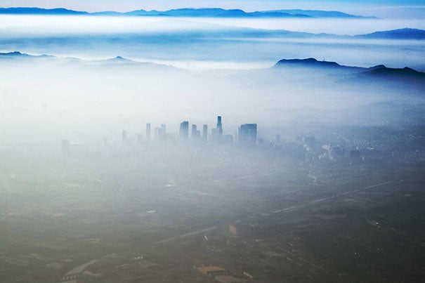 "High temperatures are also accompanied by weak winds, causing the atmosphere to stagnate. So the air just cooks and ozone levels can build up,” said Loretta J. Mickley, a co-author of the study. Pictured is the smog that sometimes blankets Los Angeles.

