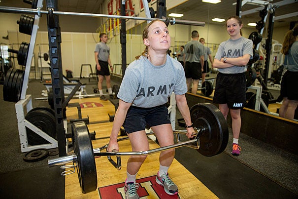 ROTC Army Cadets Charlotte "Charley" Falletta '16 (left) and Alannah O'Brien '19 go through their physical training exercises at the Murr Center. “We have a drive and we have a passion and we’re working toward something that we feel is very, very important," Falletta said of her fellow cadets. Kris Snibbe/Harvard Staff Photographer