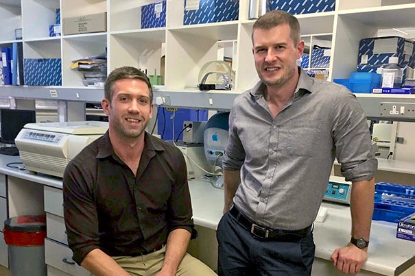 Harvard has granted a license to Aldatu Biosciences, a Cambridge-based startup, for a genotyping platform to address drug resistance in HIV patients. David Raiser (left), Ph.D.'15, and Iain MacLeod, a researcher at the Harvard Chan School, co-founded Aldatu in 2014. 