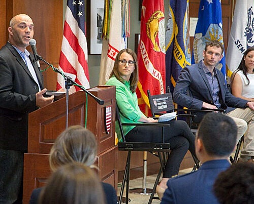 As part of Veterans Impact Day, U.S. Army Major Dennis "DJ" Skelton (from left), moderator Katie Burkhart, Iraq War veteran Josh Mantz, and former Marine Kristen Kavanaugh participated in a panel discussion. 