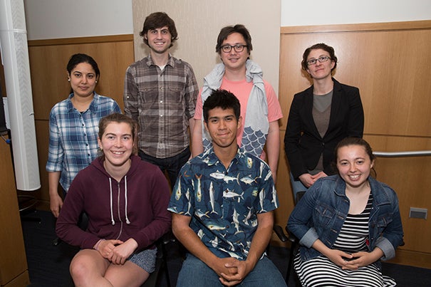 Cambridge Rindge & Latin students (front row, from left) Anna Jackson MacManus, Alex Schulman, and Emma Nour Belabbes with their mentors (back row, from left) Fatma Gomaa, Daniel Utter, Dylan Wainwright, and Aude Picard presented projects developed as part of their marine science internship. 
