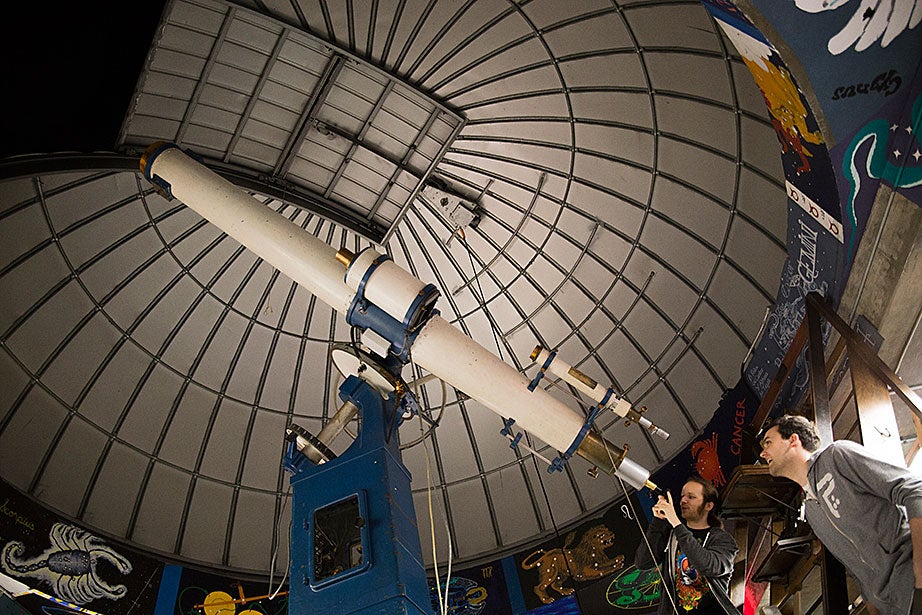 A glimpse inside the Loomis-Michael Observatory in the Science Center, which is managed by students and open to all of Harvard’s friends and affiliates. Friends Samuel Meyer '13 and Cameron French, an MIT graduate, visit the observatory often to look at the moon and Jupiter.