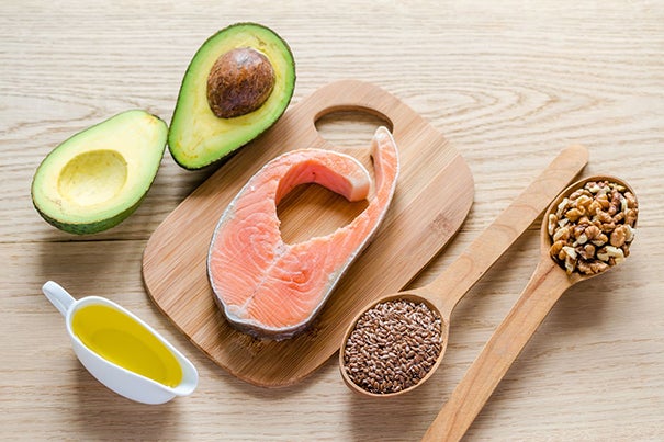 Replacing animal fats with fish and plant oils, which contain polyunsaturated fats like omega-3 and omega-6, are associated with lower risk of premature death.